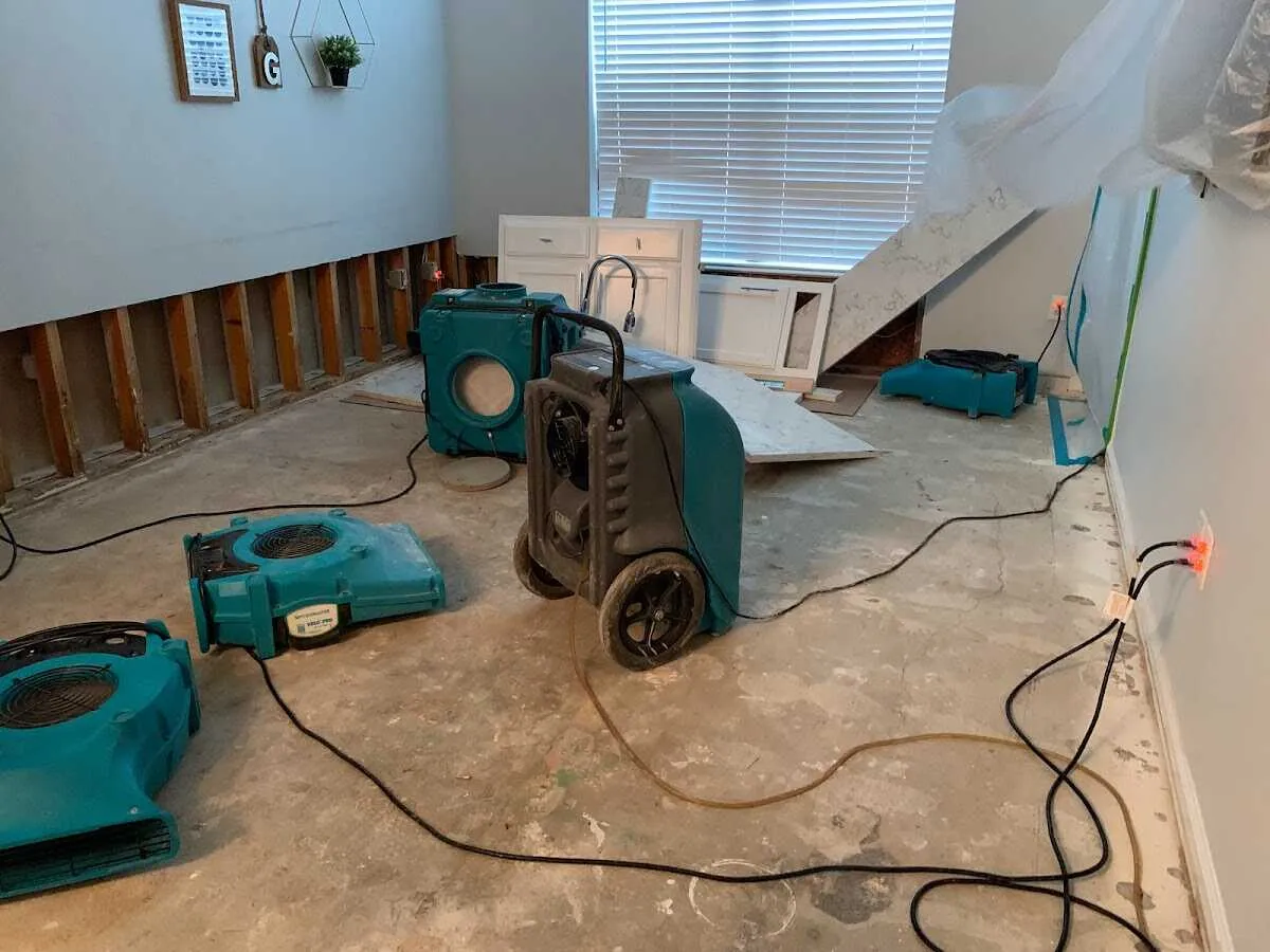 Dehumidifier in flood-cut room for Water Damage Restoration in Speedway